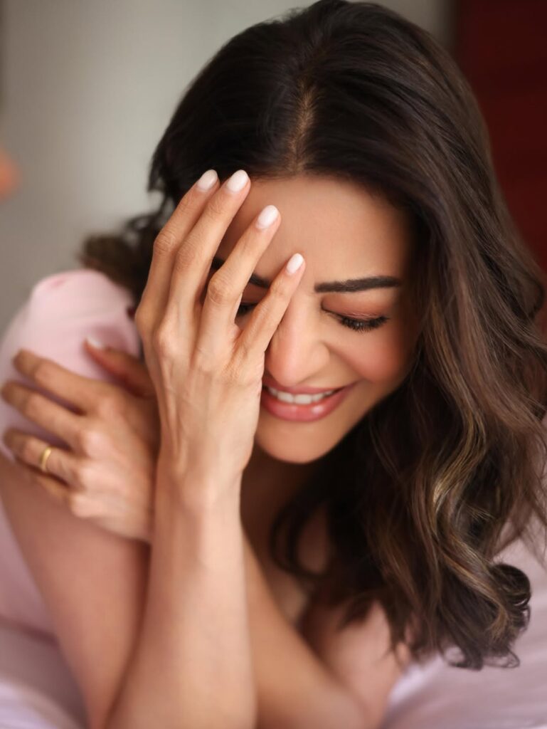 Kajal Aggarwal cute smiling face expression in latest photoshoot